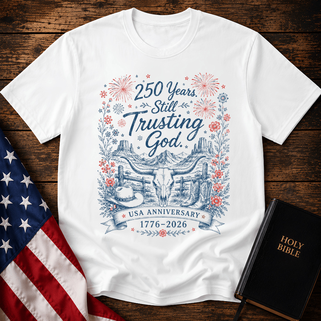 patriotic western graphic tee featuring a longhorn skull, cowboy boots, fireworks, and 1776-2026 text.
