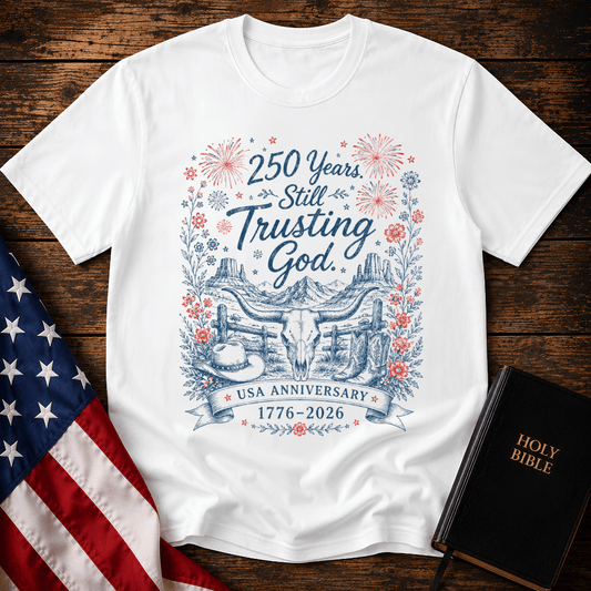 patriotic western graphic tee featuring a longhorn skull, cowboy boots, fireworks, and 1776-2026 text.