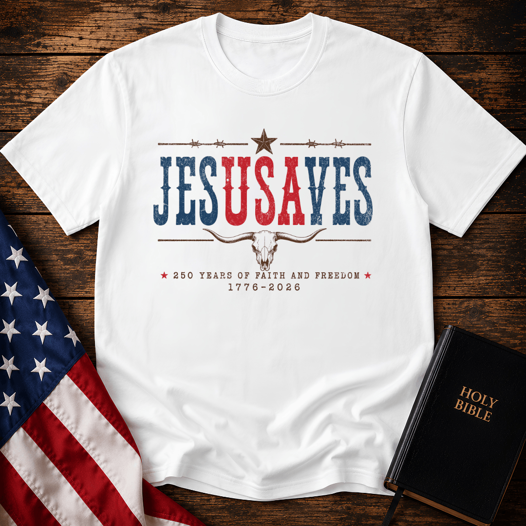 Patriotic sand colored graphic t shirt with Jesus Saves text, a longhorn skull, barbed wire, and American flag.