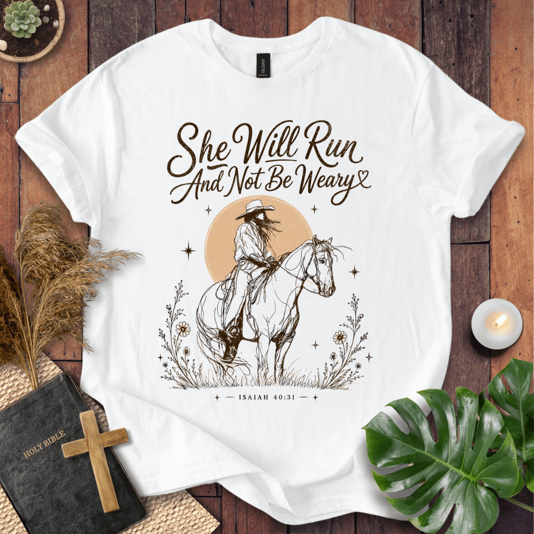 A vintage cream t-shirt featuring a sketched cowgirl on a horse under a desert sun with Isaiah 40:31.