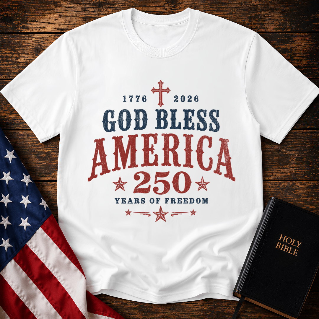 God Bless America 250 Years of Freedom t-shirt next to a Holy Bible and US flag